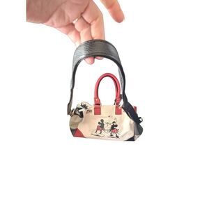 The Bradford exchange mickey Minnie love story crossbody/ top Disney